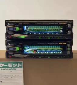 Alpine CDA-5755S and MDA-7755J — green-blue spectrum car audio stack