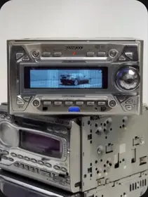 Kenwood DPX-8200WMP and Addzest — silver Y2K car audio stack